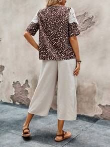 EMERY ROSE Conjunto de dos piezas para mujer de verano casual con parte superior de manga corta con encaje de flores dispersas y cuello redondo empalmada, y pantalón largo sólido con bolsillos