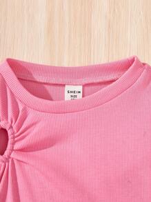 Conjunto casual para niña preadolescente con camiseta de cuello redondo y estampado de corazón hueco y pantalones