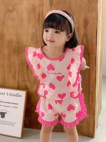 SHEIN 2 pezzi Set di top e pantaloncini con orlo a volant carino e cuore ricamato per bambine in età prescolare, abbigliamento primavera/estate