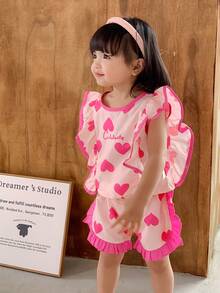SHEIN 2 pezzi Set di top e pantaloncini con orlo a volant carino e cuore ricamato per bambine in età prescolare, abbigliamento primavera/estate