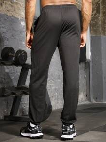 Manfinity Sport Corelite Boyfriend Style Men's Solid Color Drawstring Waist Pocketed Casual Sweatpants