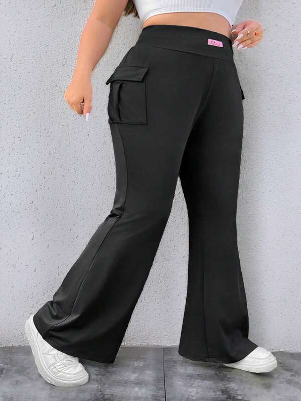 SHEIN CURVE+ Pantalones acampanados de talla grande para mujer de unicolor con bolsillos