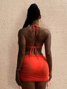 Vaytide Conjunto sexy de 2 piezas de verano para mujer con traje de baño de una pieza de cuello halter en unicolor con diseño de agujeros y falda mini plisada con cordón lateral, ideal para la playa - Naranja - Ver 2