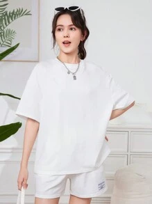 SHEIN Bộ áo thun và quần short dệt kim màu trắng cho cô gái tuổi teen, trang phục thường ngày đơn giản với miếng dán nhãn dệt phía sau, 2 chiếc - trắng - Xem 4