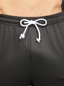 Manfinity Sport Corelite Boyfriend Style Men's Solid Color Drawstring Waist Pocketed Casual Sweatpants