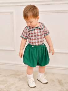 SHEIN Conjunto de 2 piezas de camisa a cuadros y shorts de estilo universitario retro para niños pequeños con cuello volteado, atuendo de primavera y verano para regreso a la escuela