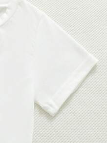 SHEIN 4pcs/Set Young Girl Casual Holiday Summer Floral Printed T-Shirt With Daisy, Colored Flowers And Book Printed Patterns, Perfect For Back To School Season, Black & White And Apricot Colored Matching