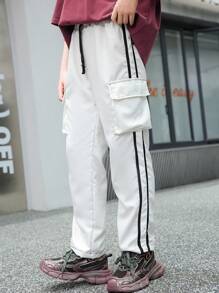 SHEIN Modische gestreifte lange Mädchenhose mit seitlichem Taschendesign, Größe 6-1-1 - Schwarz und Weiss - Übersicht 1