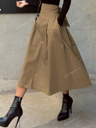 Elegantes Raveoutfit im Stil von Europa und den USA, neuer A-Linien Rock für den Urlaub, Damen Regenschirm Rock mit Schleife, großer Schwingrock, schmale Taille, langer Rock für alle Jahreszeiten, modischer einfarbiger Damen Minirock