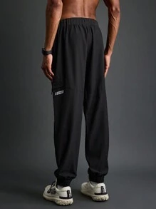 Manfinity Sport Corelite Quần jogger nam kiểu boyfriend dáng suông, thích hợp cho công sở và thể thao. - màu đen - Xem 2