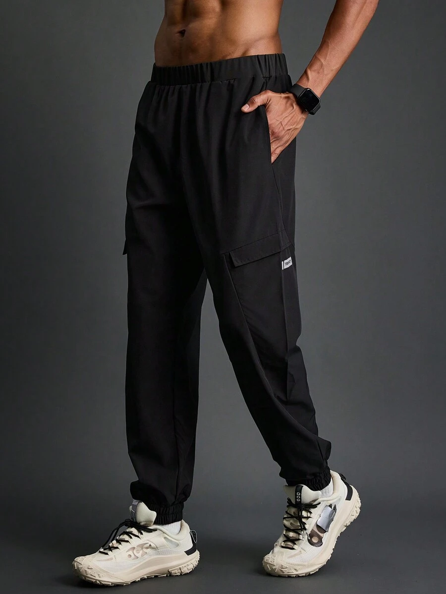 Manfinity Sport Corelite Quần jogger nam kiểu boyfriend dáng suông, thích hợp cho công sở và thể thao. - màu đen - Xem 1