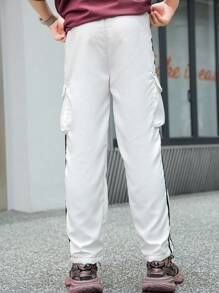SHEIN Modische gestreifte lange Mädchenhose mit seitlichem Taschendesign, Größe 6-1-1 - Schwarz und Weiss - Übersicht 2