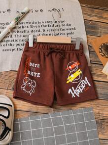 SHEIN 女孩們可愛微笑臉字母印花熊彈性腰休閒短褲，適用於日常穿著和度假，夏季