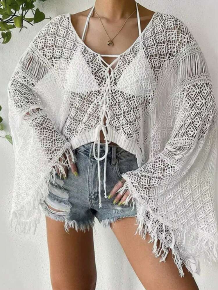 Plus Size Women's Hollow Out Vacation Loose Knitted Top With Drop Shoulder, Fringed Hem And Front Tie