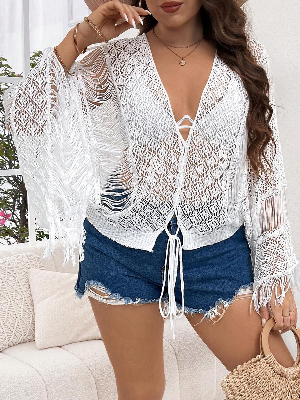 Plus Size Women's Hollow Out Vacation Loose Knitted Top With Drop Shoulder, Fringed Hem And Front Tie