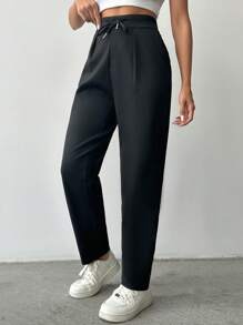 Pantaloni uni cu șnur în talie