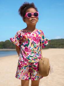 SHEIN Conjunto de top holgado con volantes y hombros descubiertos y pantalones cortos estampados de vacaciones para niñas jóvenes