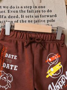 SHEIN 女孩們可愛微笑臉字母印花熊彈性腰休閒短褲，適用於日常穿著和度假，夏季