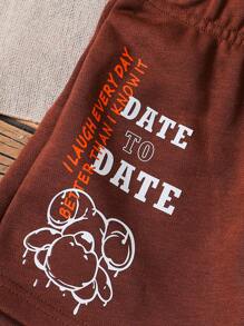 SHEIN 女孩們可愛微笑臉字母印花熊彈性腰休閒短褲，適用於日常穿著和度假，夏季