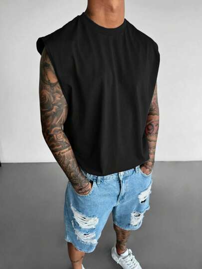 2025 Nueva Camiseta de tirantes ancha de unicolor de verano para hombre, cuello redondo, sin mangas, casual, estilo hip hop