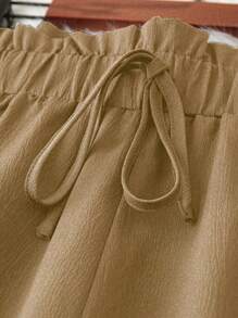 SHEIN LUNE Pantalones de pierna ancha de cintura con volante con nudo delantero