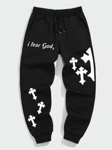 Manfinity Dauomo Pantalones jogger para hombre con diseño estampado de lema, cintura con cordón, bolsillos y bajo con puño para rave