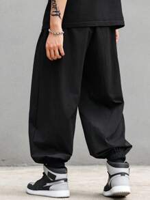 Manfinity EMRG Pantaloni jogger da uomo con coulisse e tasche, pantaloni lunghi tinta unita oversize neri, adatti come regalo per marito o fidanzato, per il ritorno a scuola