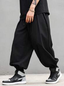 Manfinity EMRG Pantaloni jogger da uomo con coulisse e tasche, pantaloni lunghi tinta unita oversize neri, adatti come regalo per marito o fidanzato, per il ritorno a scuola