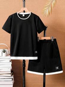 Kontrast-Farbiges Patchwork Jungen Set aus Kurzarmshirt und Shorts, geeignet für Lässig und Sportbekleidung
