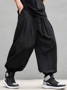Manfinity EMRG Pantaloni jogger da uomo con coulisse e tasche, pantaloni lunghi tinta unita oversize neri, adatti come regalo per marito o fidanzato, per il ritorno a scuola