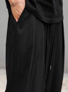 Manfinity EMRG Pantaloni jogger da uomo con coulisse e tasche, pantaloni lunghi tinta unita oversize neri, adatti come regalo per marito o fidanzato, per il ritorno a scuola