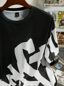Manfinity Roughcore Herren Sommer Lässig Kurzarm T-Shirt mit Rundhalsausschnitt und Buchstaben Aufdruck - Schwarz - Übersicht 6
