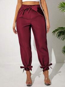 Pantaloni casual pieghettati a vita regolabile di colore unito, taglio a sigaro, taglie comode