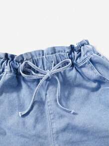Pantalones cortos de mezclilla para mujer de cintura alta y ajuste suelto con cinturón y dobladillo enrollado en los bolsillos - Lavado ligero - Ver 7