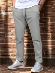 Pantalones de deporte casuales rectos con cintura con cordón y bolsillos para hombre