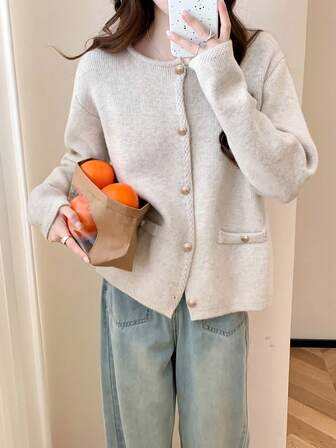 女士纯色落肩长袖休闲简约圆领针织开衫，秋冬款