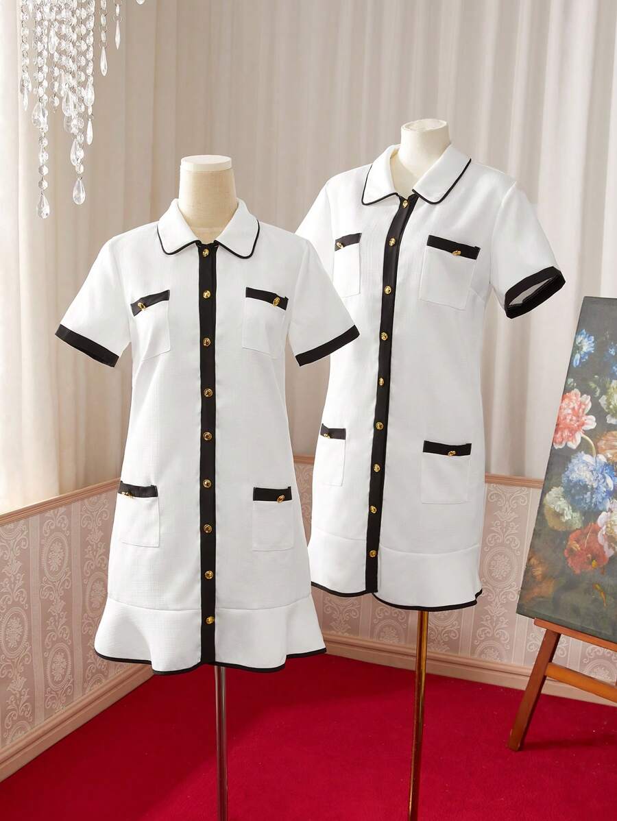 Đầm khoét rỗng tay ngắn khuy kim loại dành cho nữ của Madeline - Đen và trắng - Xem 1