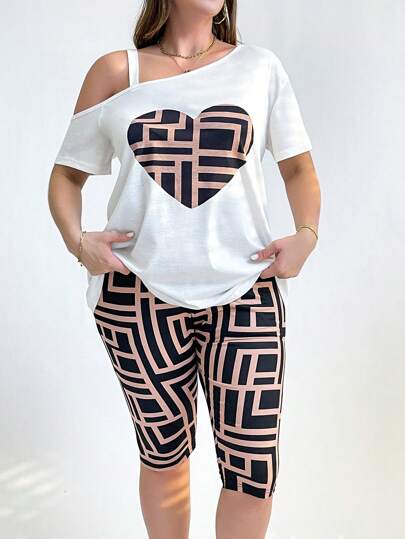 SHEIN Essnce مجموعة رياضية كاجوال فضفاضة للنساء ذوات الأحجام الكبيرة مطبوعة بالقلوب، ملابس صيفية للنساء، مجموعة للخروج، مجموعة بنطلون قطعتين، أطقم ملابس، مجموعة شورت دراجات، مجموعة تيشيرتات نسائية مطبوعة، ملابس للمعلمات