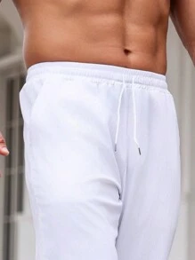 Manfinity Homme Pantalon décontracté pour homme avec cordon de serrage à la taille, jambe droite et coupe ample de couleur unie - Blanc - Voir 3