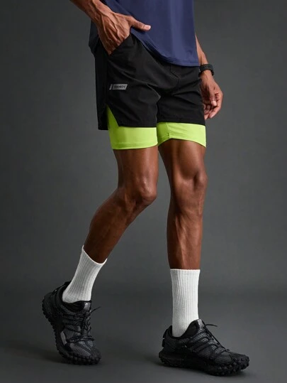 Manfinity Sport Corelite Pantalones cortos deportivos con bolsillos y estampado de letras, estilo novio, para entrenamiento diario y sudadera