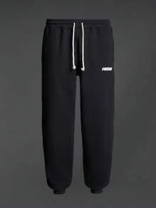 Manfinity Sport Corelite Boyfriend Style Men's Solid Color Drawstring Waist Pocketed Casual Sweatpants
