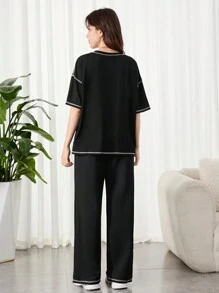 SHEIN Teen Girls Black & Contrast Thread Woven Patchwork Loose Knit T-Shirt And Wide-Leg Split Hem Pants 2pcs Outfits, Casual/Streetwear
