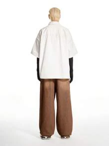 NEON BLANC X VICTOR VON SCHWARZ Pantalones de estilo cargo con bolsillos grandes y diseño de corte holgado