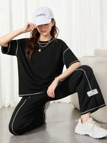 SHEIN Teen Girls Black & Contrast Thread Woven Patchwork Loose Knit T-Shirt And Wide-Leg Split Hem Pants 2pcs Outfits, Casual/Streetwear
