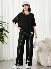 SHEIN Teen Girls Black & Contrast Thread Woven Patchwork Loose Knit T-Shirt And Wide-Leg Split Hem Pants 2pcs Outfits, Casual/Streetwear