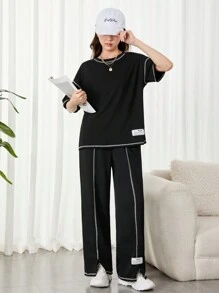 SHEIN Teen Girls Black & Contrast Thread Woven Patchwork Loose Knit T-Shirt And Wide-Leg Split Hem Pants 2pcs Outfits, Casual/Streetwear