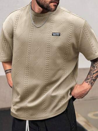 Manfinity Homme Camiseta casual de manga corta con estampado de letra California, cuello redondo, para hombres de talla grande, para ocasiones informales