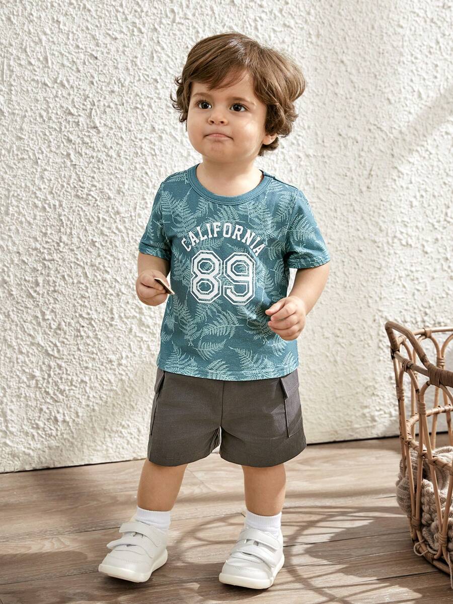 Cozy Pixies Bộ áo ngắn tay và quần short cổ tròn dệt kim mềm mại cho bé trai có họa tiết in hoa và cây, trang phục thường ngày, 2 chiếc - màu xanh lá - Xem 1