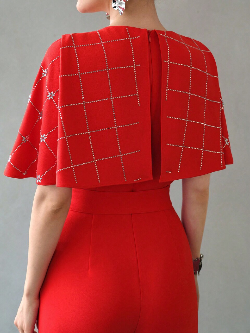 RHINESTONE DETAIL BUCKLE BELTED SLANT POCKET CAPE JUMPSUIT