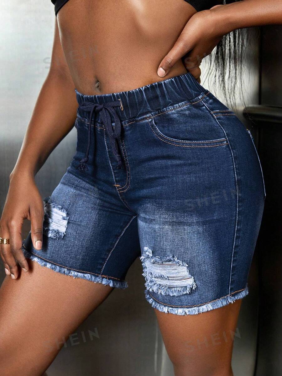SHEIN SXY Shorts de mezclilla rasgados con dobladillo crudo y cintura con cordón
